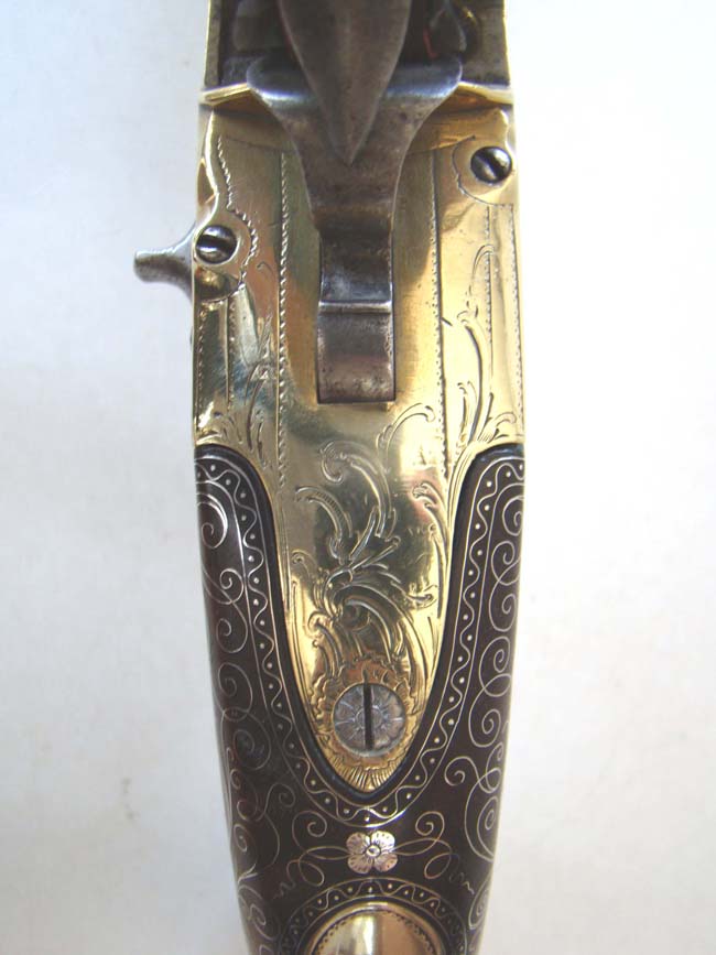A Magnificent Brass Double Barreled Flintlock Pistol with Silver Inlays by John Parkes of London circa 1770. — image 9